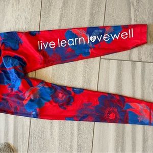 Peloton Emma Lovewell WITH Red Blue Floral Leggings Wear It To Heart Women’s L